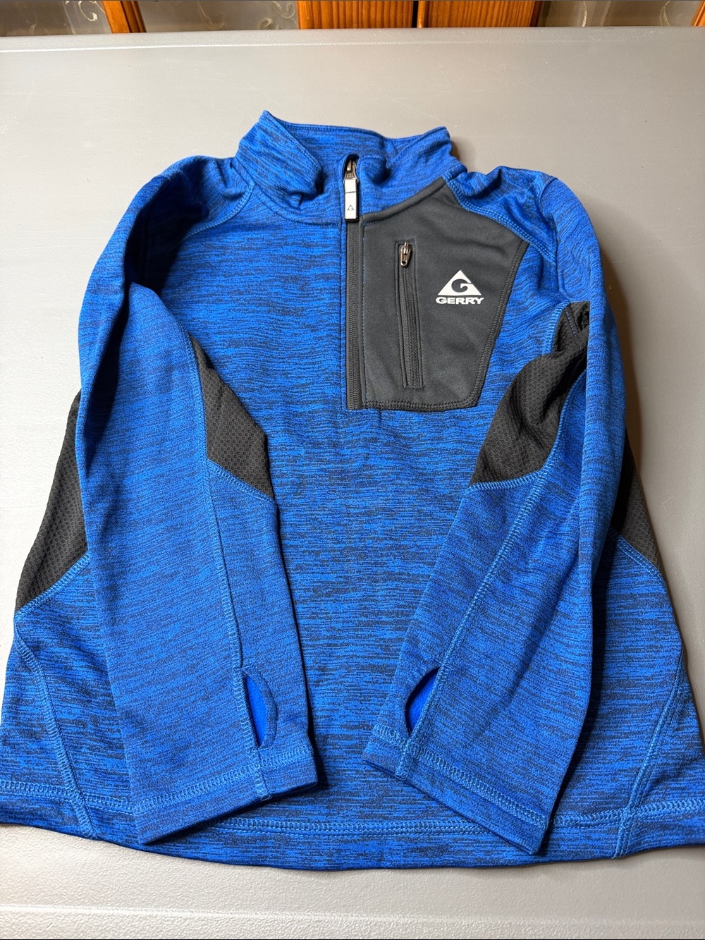 Kid’s Gerry Quarter-Zip Performance Pullover. Size: 7-8